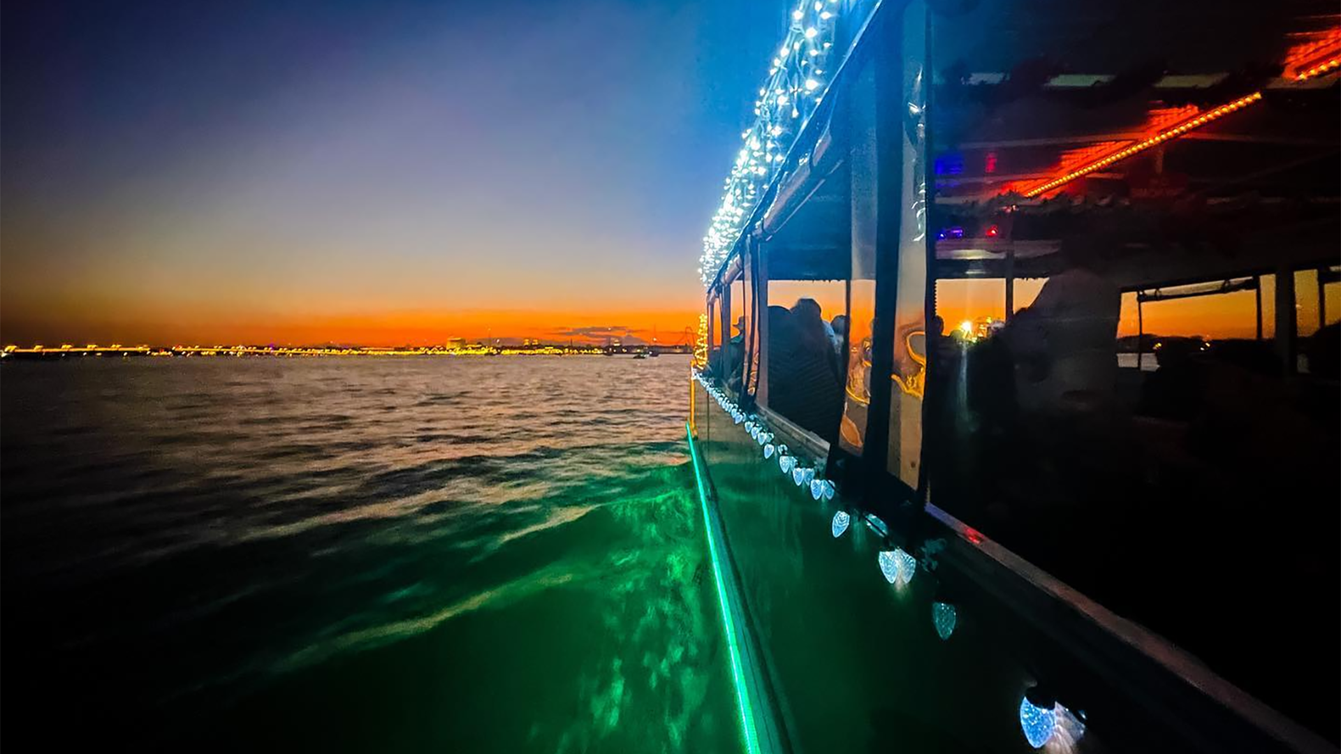boat tour with a view of city lights